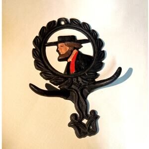 1122.  Vintage Cast Iron Wall Hanging with Hooks